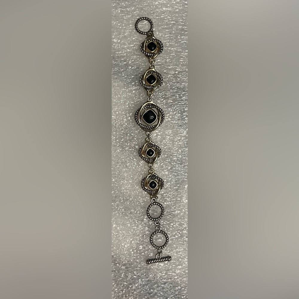 Silver linked bracelet. 7”
